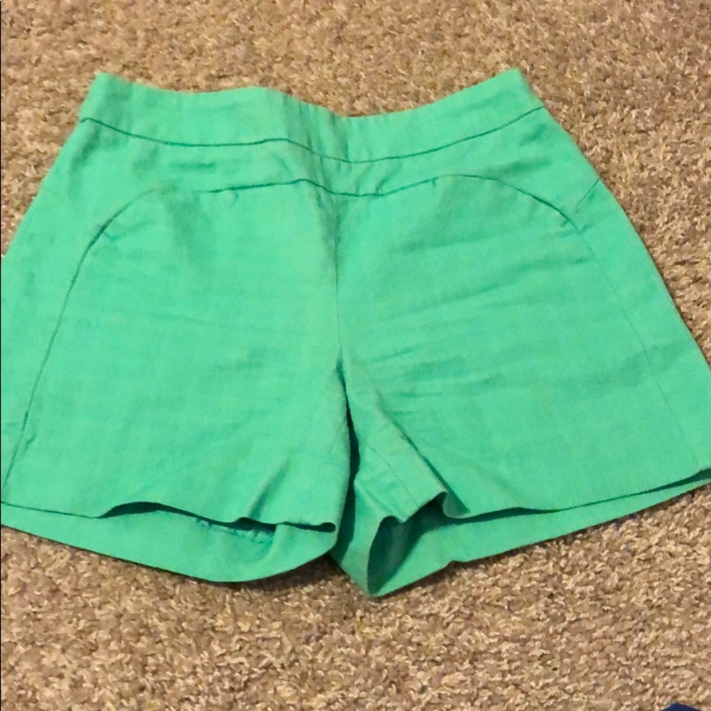 Green high waisted shorts from Anthropologie